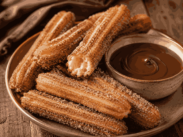 Homemade Mexican churros with chocolate dipping sauce