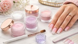 acrylic nail powder with brush and finished acrylic nails