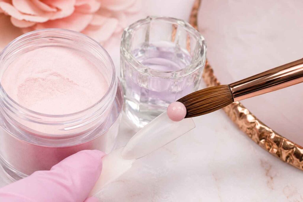 acrylic powder and monomer used to create a nail bead